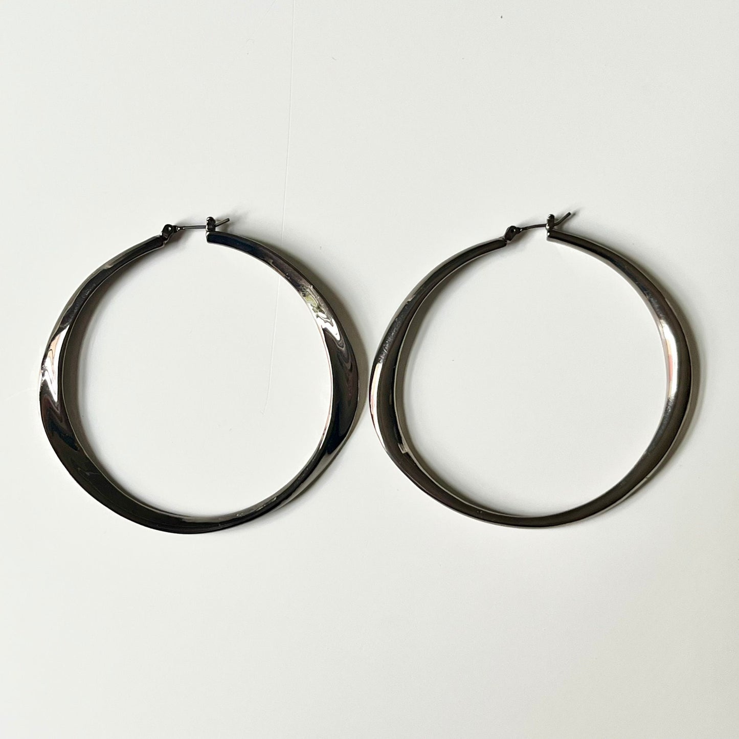 Silver Plated Hoop with Twisted Elongated Shape