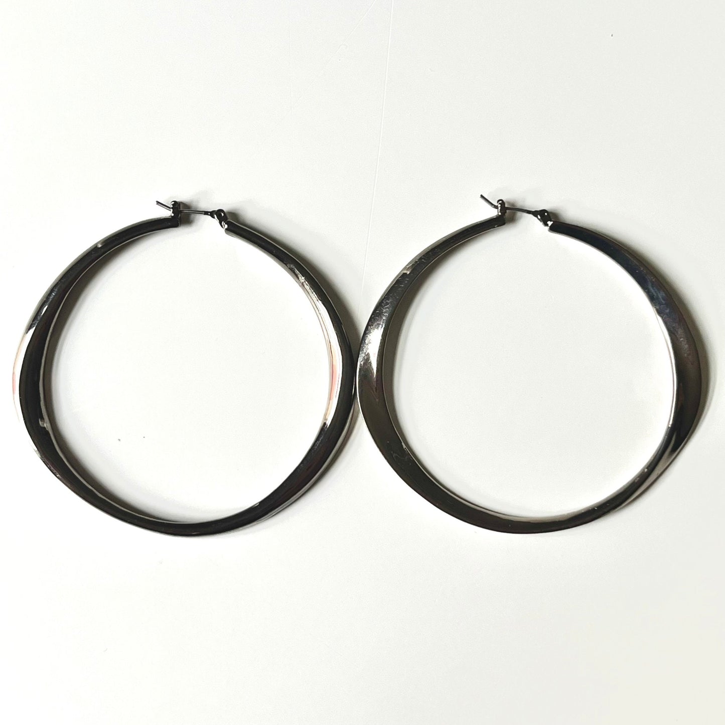 Silver Plated Hoop with Twisted Elongated Shape