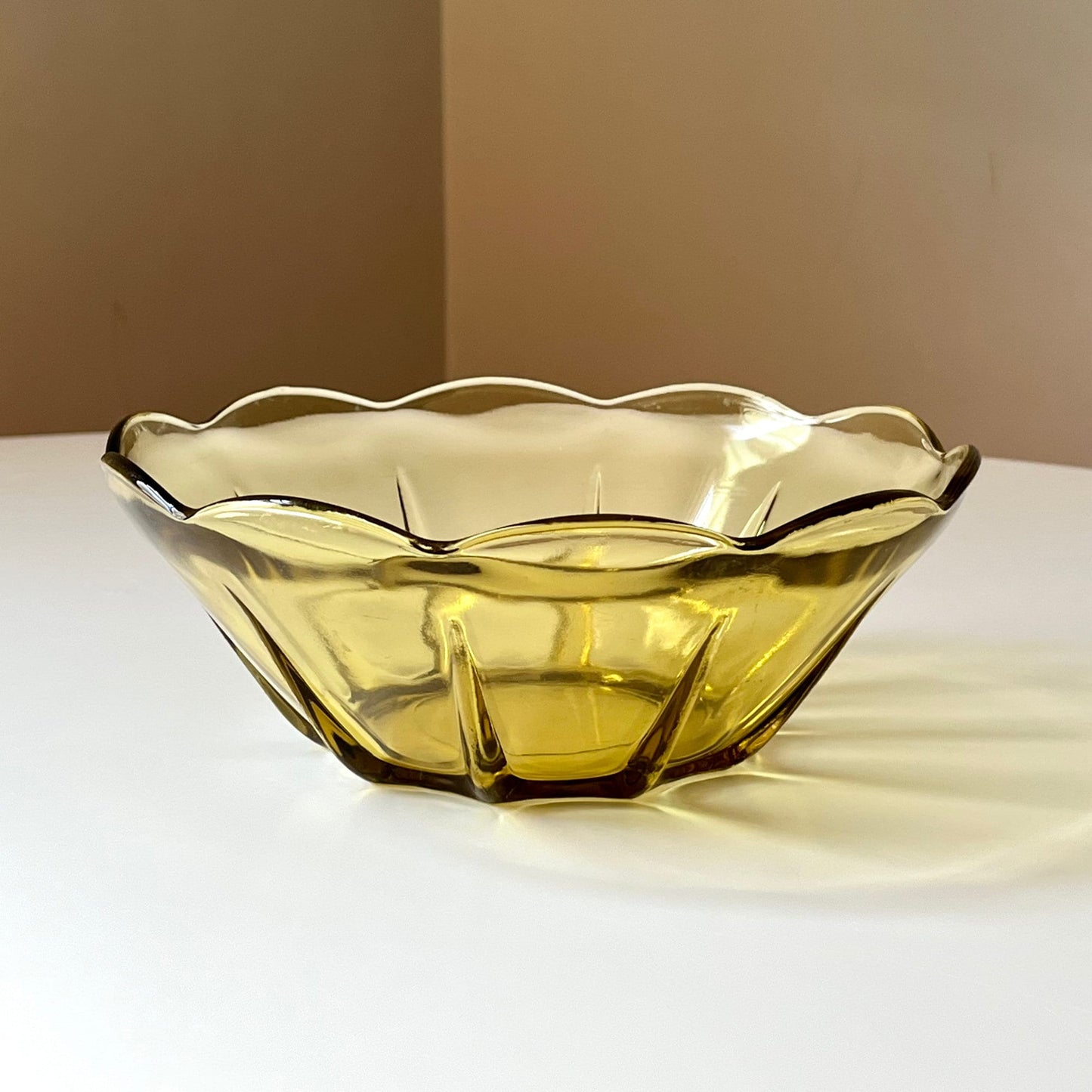 Amber Glass Serving Bowl with Scalloped Pattern