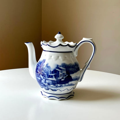 Ceramic Teapot with an Intricate Country Scene