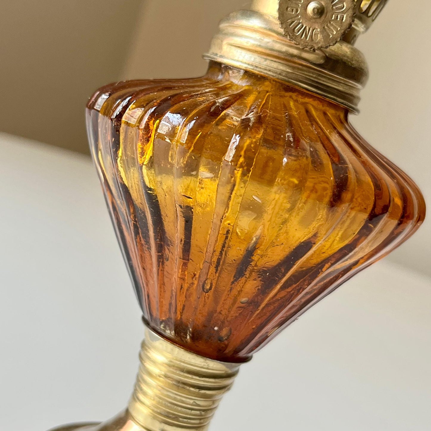 Amber Hurricane Lamp with Brass Colored Accents