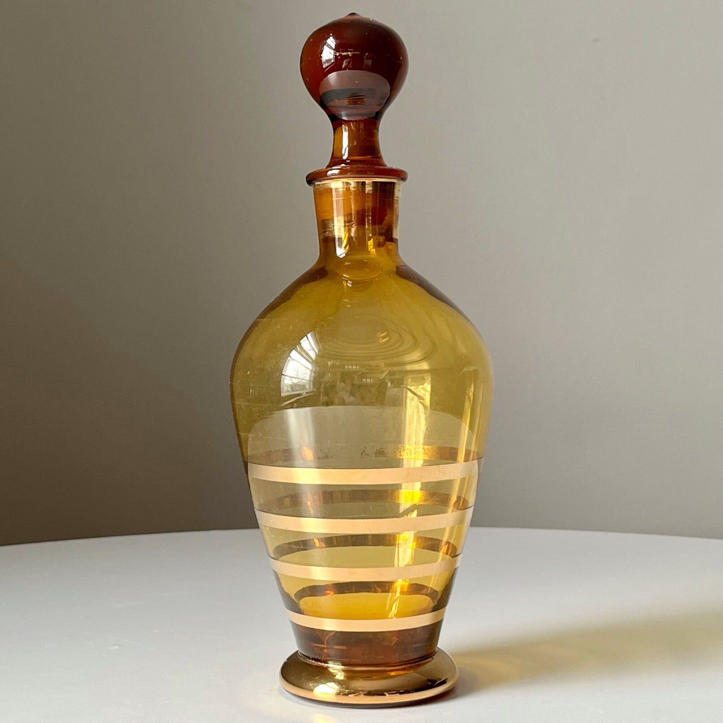 Romanian Amber Glass Liquor Decanter with Metallic Gold Design